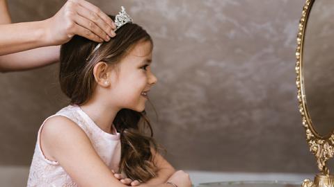 Mom Crowns Princess Daughter