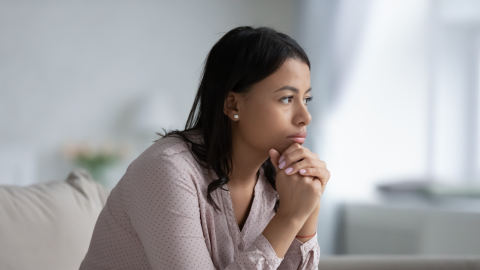 worried-woman-sitting-1200.png